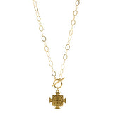 Be the object of every gaze. Our ARIANA, cross pendant necklace, will do just that. A large, matte, golden cross pendant is suspended from a 14kt gold-filled toggle on 14kt gold-filled chain. Go ahead and take the spotlight. DETAILS & FIT Measures 18" 14kt gold-filled chain 14kt gold-filled toggle closure 18kt matte gold overlay pendant. Made to last and Made in the USA. A woman owned and operated business