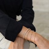 14kt Gold and Trio Diamond Five Station Flex Bracelet